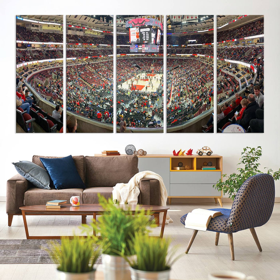 A panoramic view captures the bustling United Center during a Chicago Bulls game, showcasing the action on court and a prominent scoreboard overhead, ideal for immortalizing as a museum-quality canvas print.