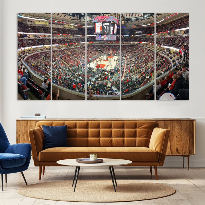 A panoramic view captures the bustling United Center during a Chicago Bulls game, showcasing the action on court and a prominent scoreboard overhead, ideal for immortalizing as a museum-quality canvas print.