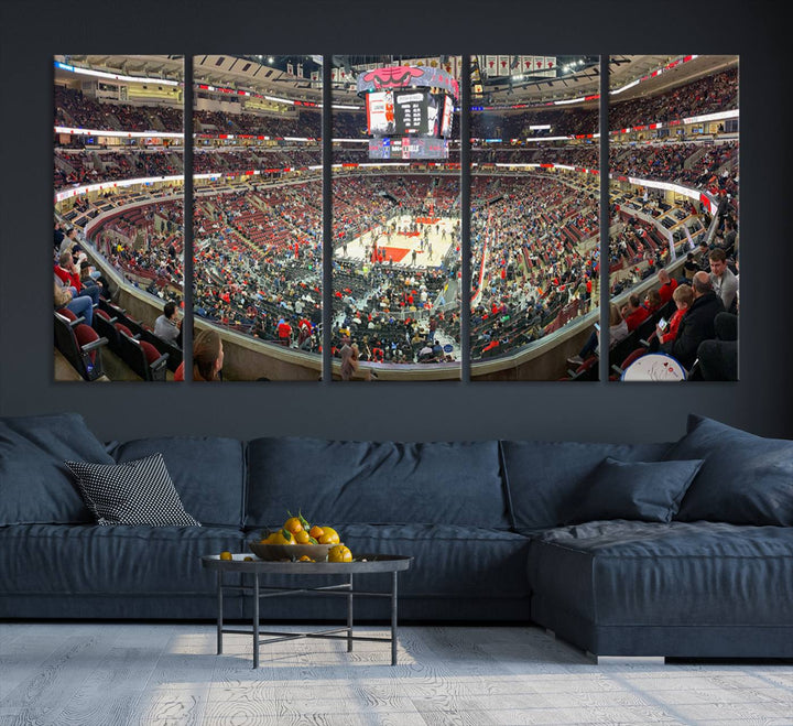 A panoramic view captures the bustling United Center during a Chicago Bulls game, showcasing the action on court and a prominent scoreboard overhead, ideal for immortalizing as a museum-quality canvas print.