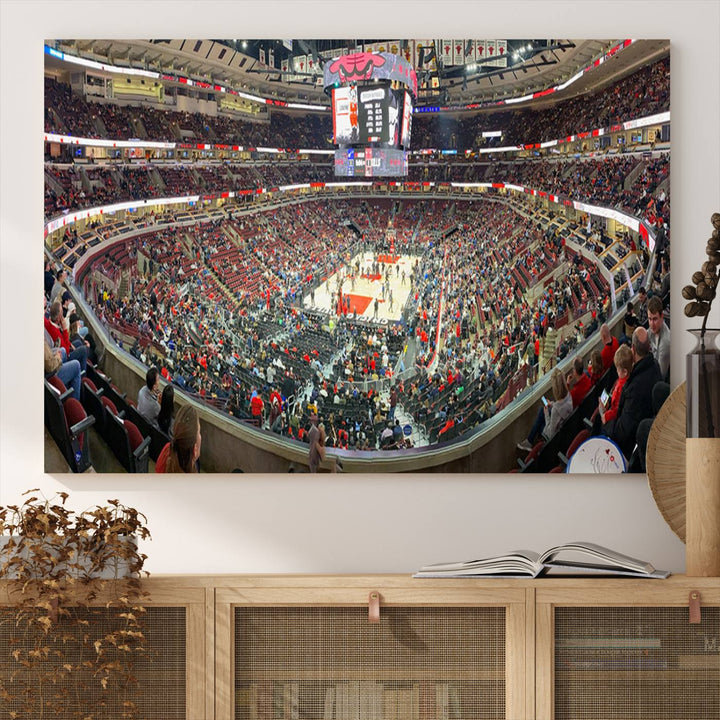 A panoramic view captures the bustling United Center during a Chicago Bulls game, showcasing the action on court and a prominent scoreboard overhead, ideal for immortalizing as a museum-quality canvas print.