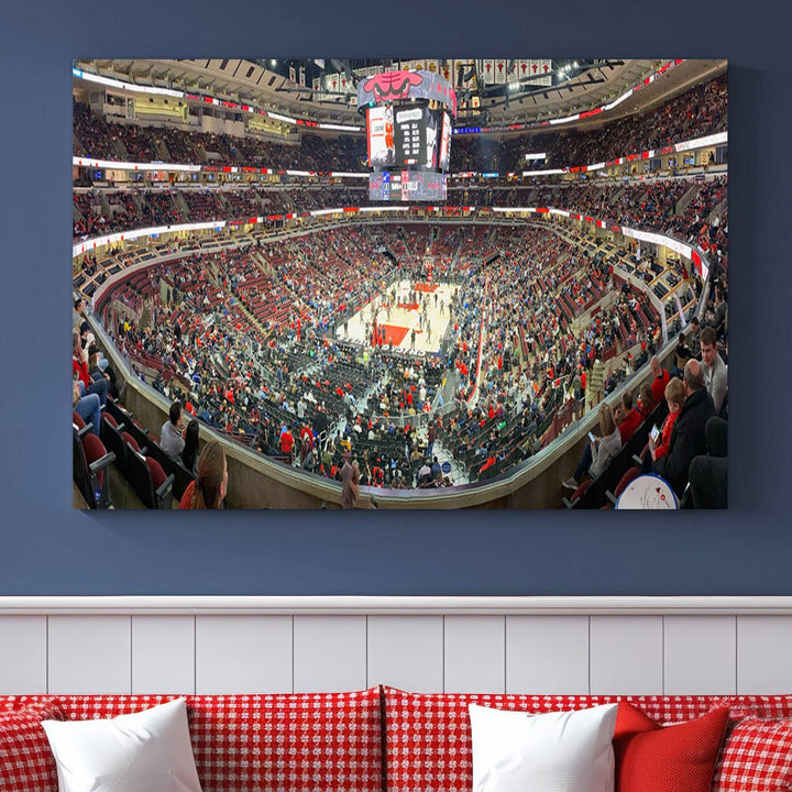 A panoramic view captures the bustling United Center during a Chicago Bulls game, showcasing the action on court and a prominent scoreboard overhead, ideal for immortalizing as a museum-quality canvas print.