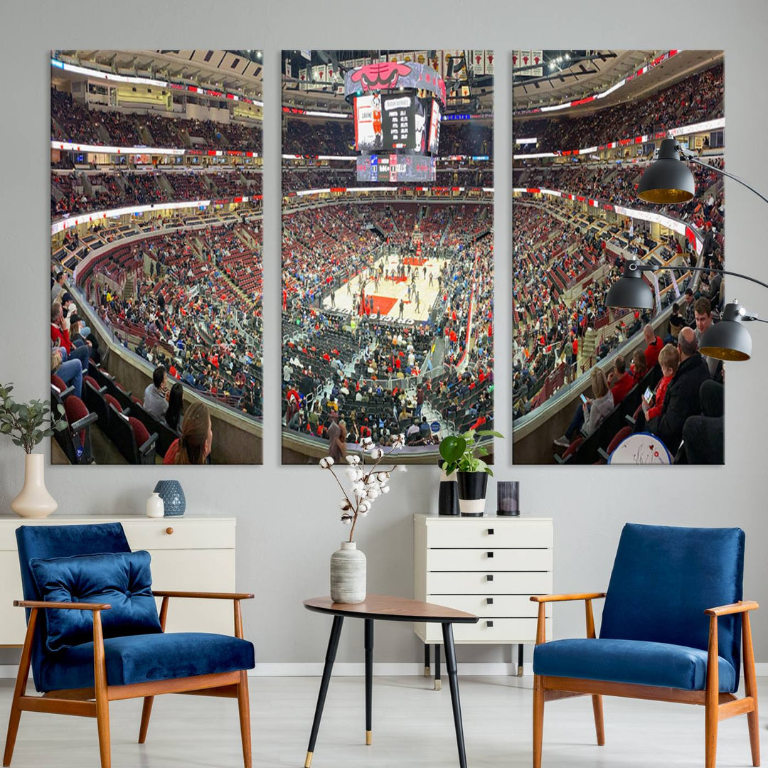 A panoramic view captures the bustling United Center during a Chicago Bulls game, showcasing the action on court and a prominent scoreboard overhead, ideal for immortalizing as a museum-quality canvas print.