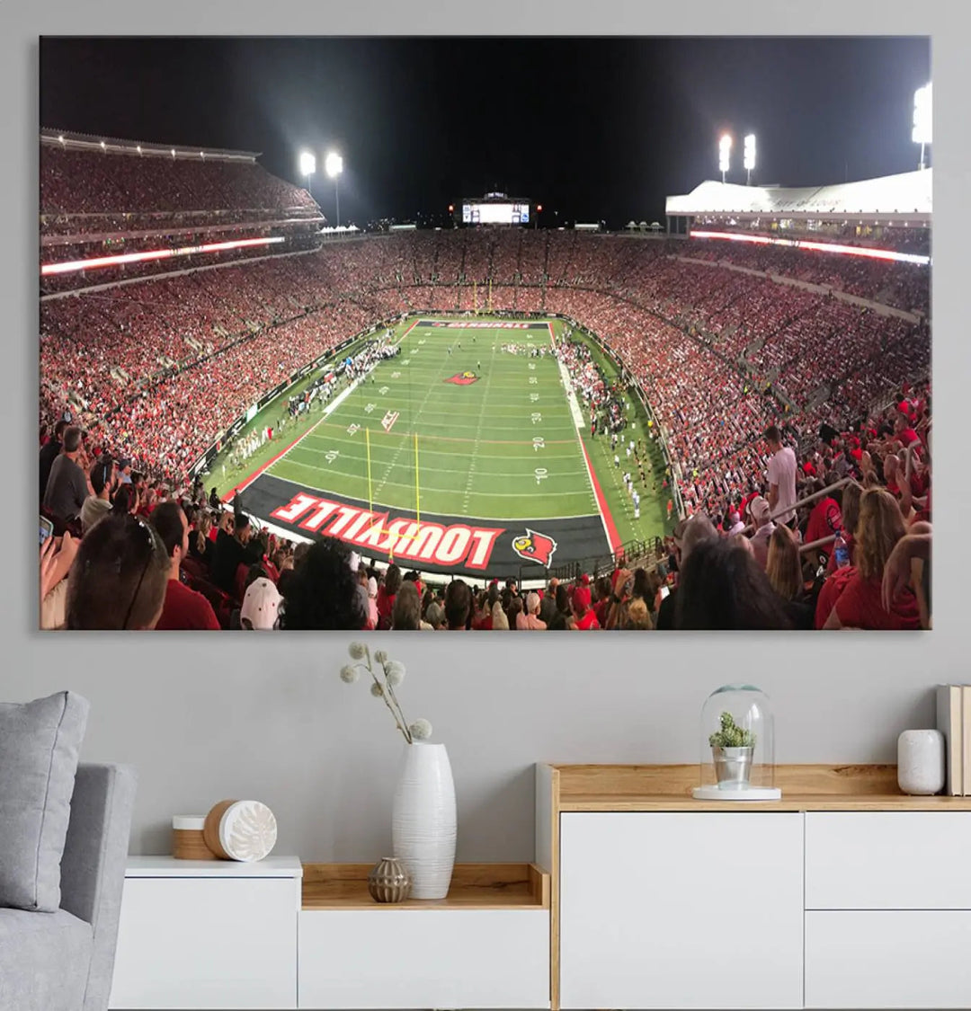 A University of Louisville Cardinals football team triptych, displayed on premium canvas, adorns a white wall.