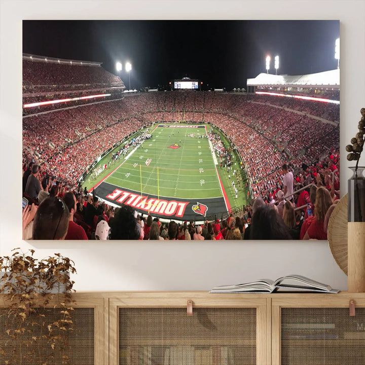 A University of Louisville Cardinals football team triptych, displayed on premium canvas, adorns a white wall.