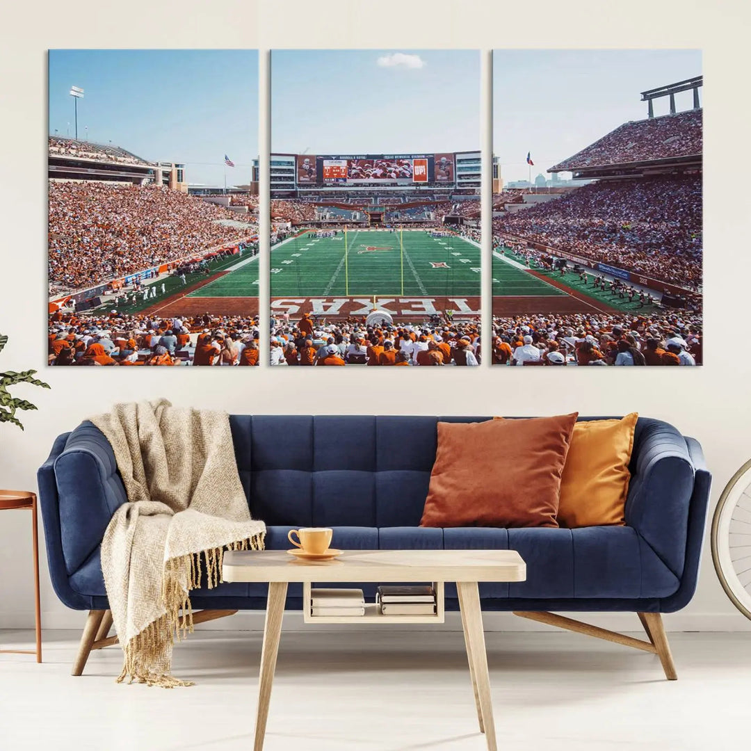 A University of Texas Longhorns Football Team Print, depicting the bustling Darrell K Royal-Texas Memorial Stadium at Campbell-Williams Field, is mounted in a modern living room.