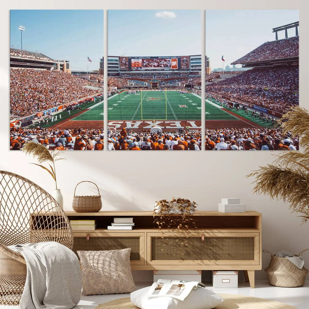 A University of Texas Longhorns Football Team Print, depicting the bustling Darrell K Royal-Texas Memorial Stadium at Campbell-Williams Field, is mounted in a modern living room.