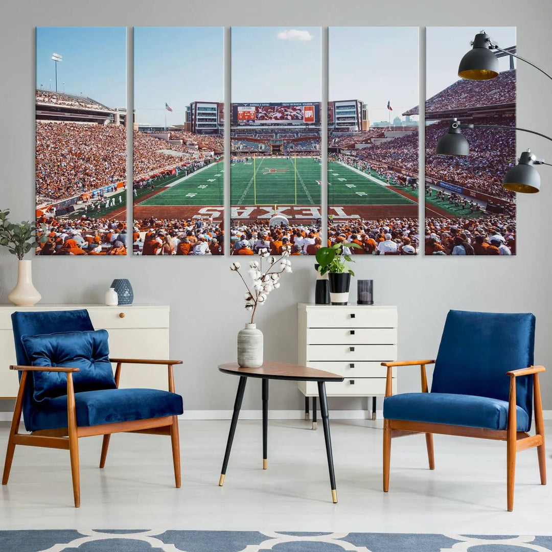 A University of Texas Longhorns Football Team Print, depicting the bustling Darrell K Royal-Texas Memorial Stadium at Campbell-Williams Field, is mounted in a modern living room.