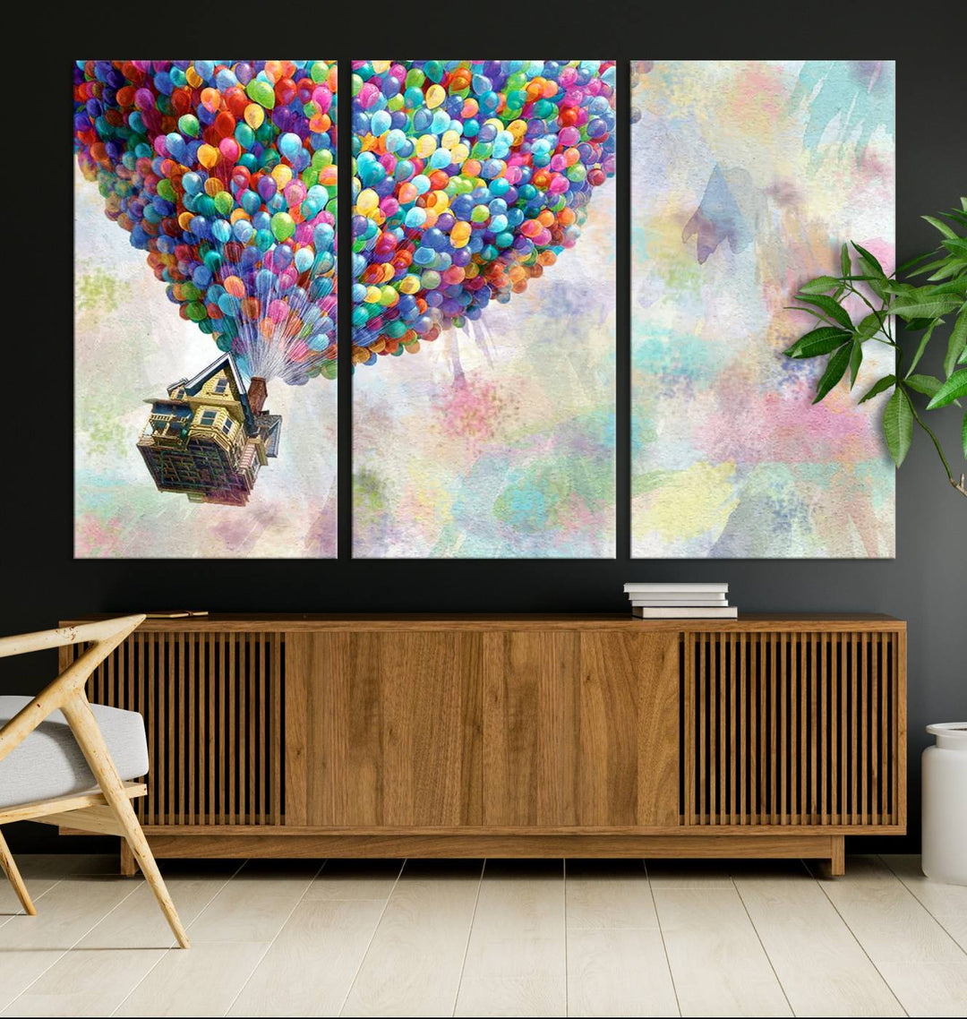 The wall art is an Up Pixar Poster featuring a house with balloons.