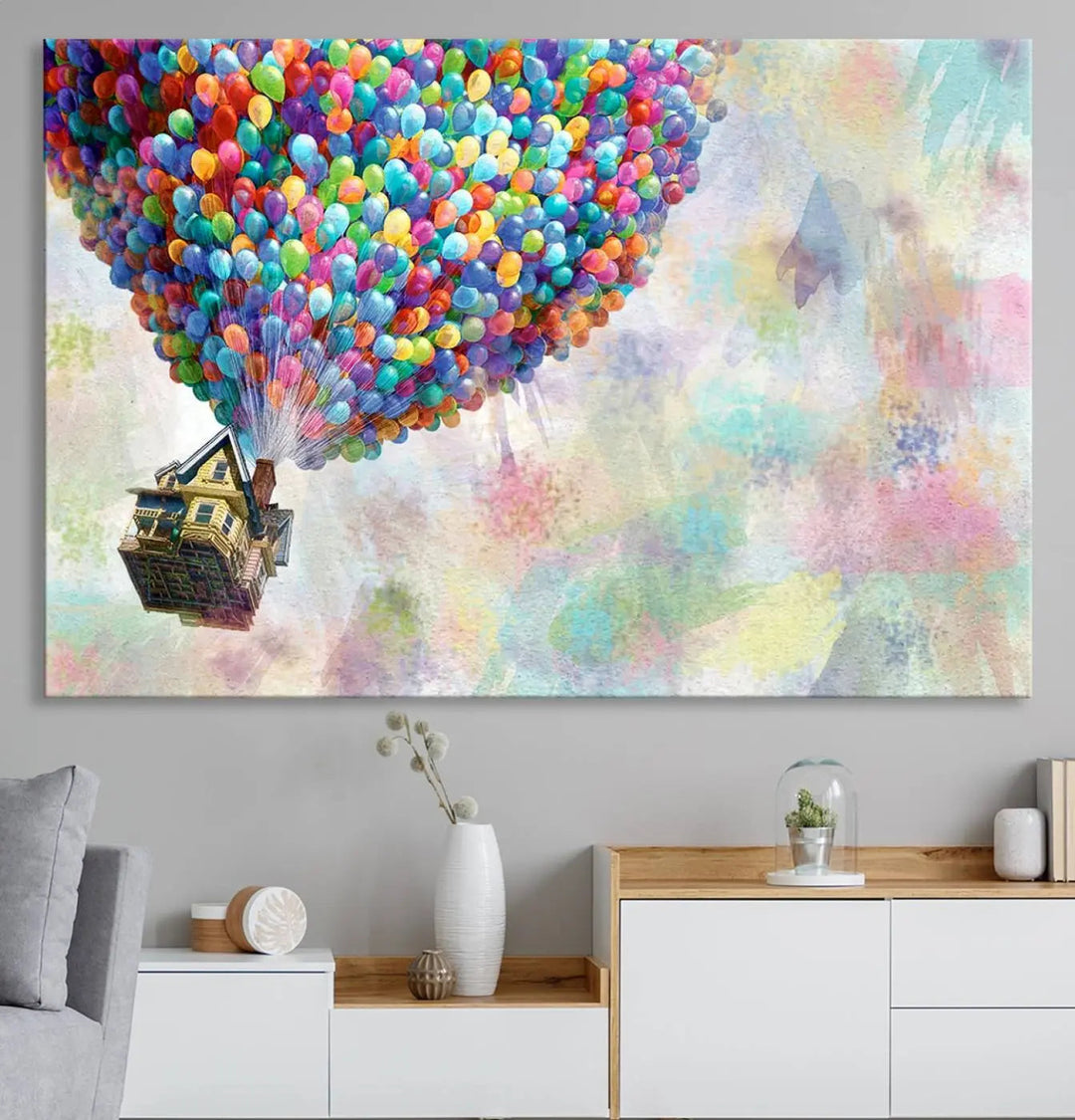 The wall art is an Up Pixar Poster featuring a house with balloons.