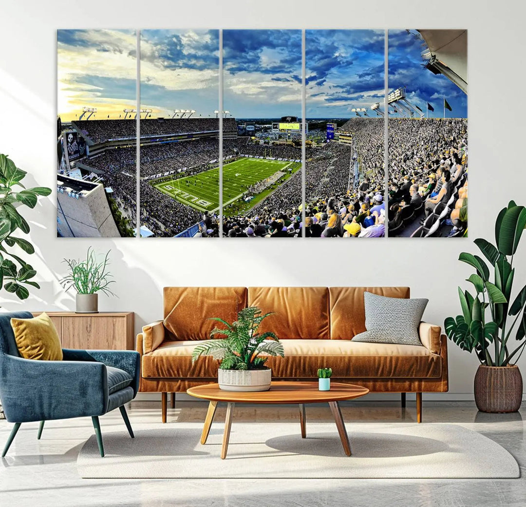 A panoramic view of a crowded Raymond James Stadium at sunset, featuring the USF Bulls Football Team, is captured on premium canvas to create stunning wall art.