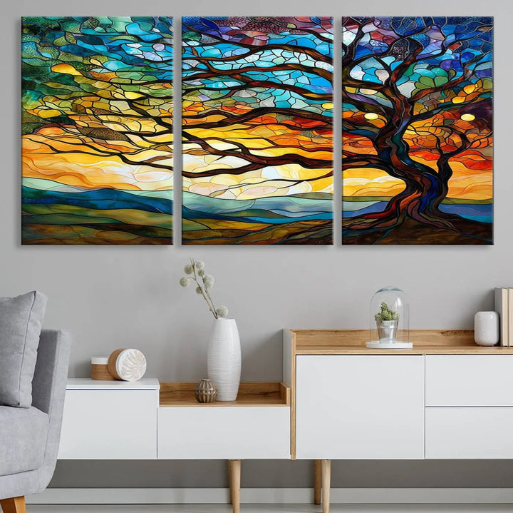 The Vibrant Mosaic Tree of Life Wall Art, with its stained glass style canvas print, is cleverly divided into three panels.