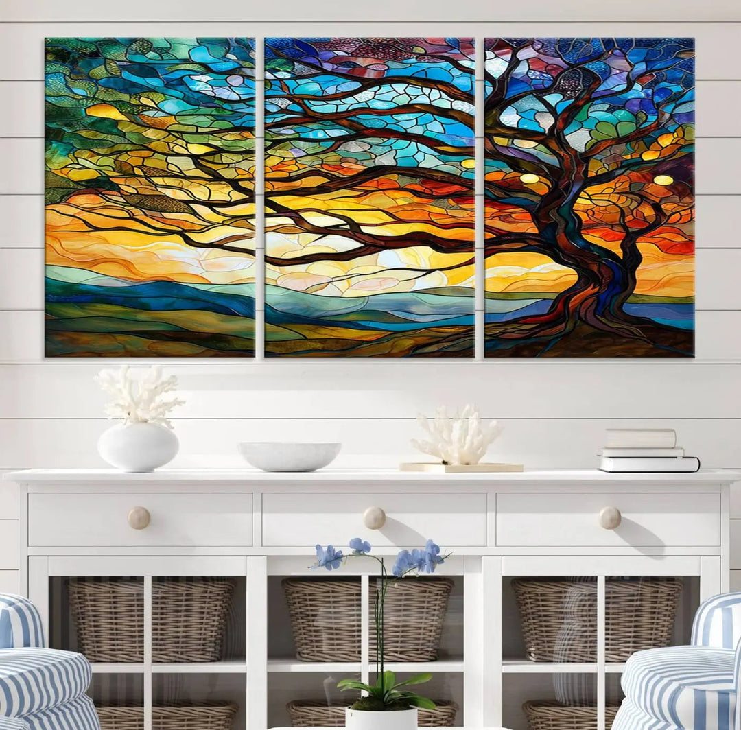 The Vibrant Mosaic Tree of Life Wall Art, with its stained glass style canvas print, is cleverly divided into three panels.