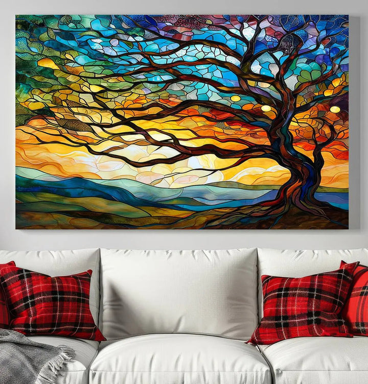 The Vibrant Mosaic Tree of Life Wall Art, with its stained glass style canvas print, is cleverly divided into three panels.