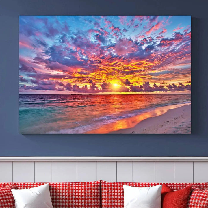 The living room showcases vibrant tropical sunset beach wall art canvas prints, highlighting a captivating coastal ocean waves scene.