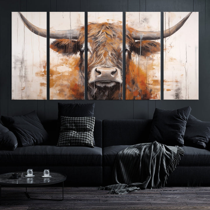 The "Vintage Scottish Highland Cow Cattle Art Print Farmhouse Wall Art Canvas Print" brings rustic elegance to a living room with its depiction of a highland cow with large horns.