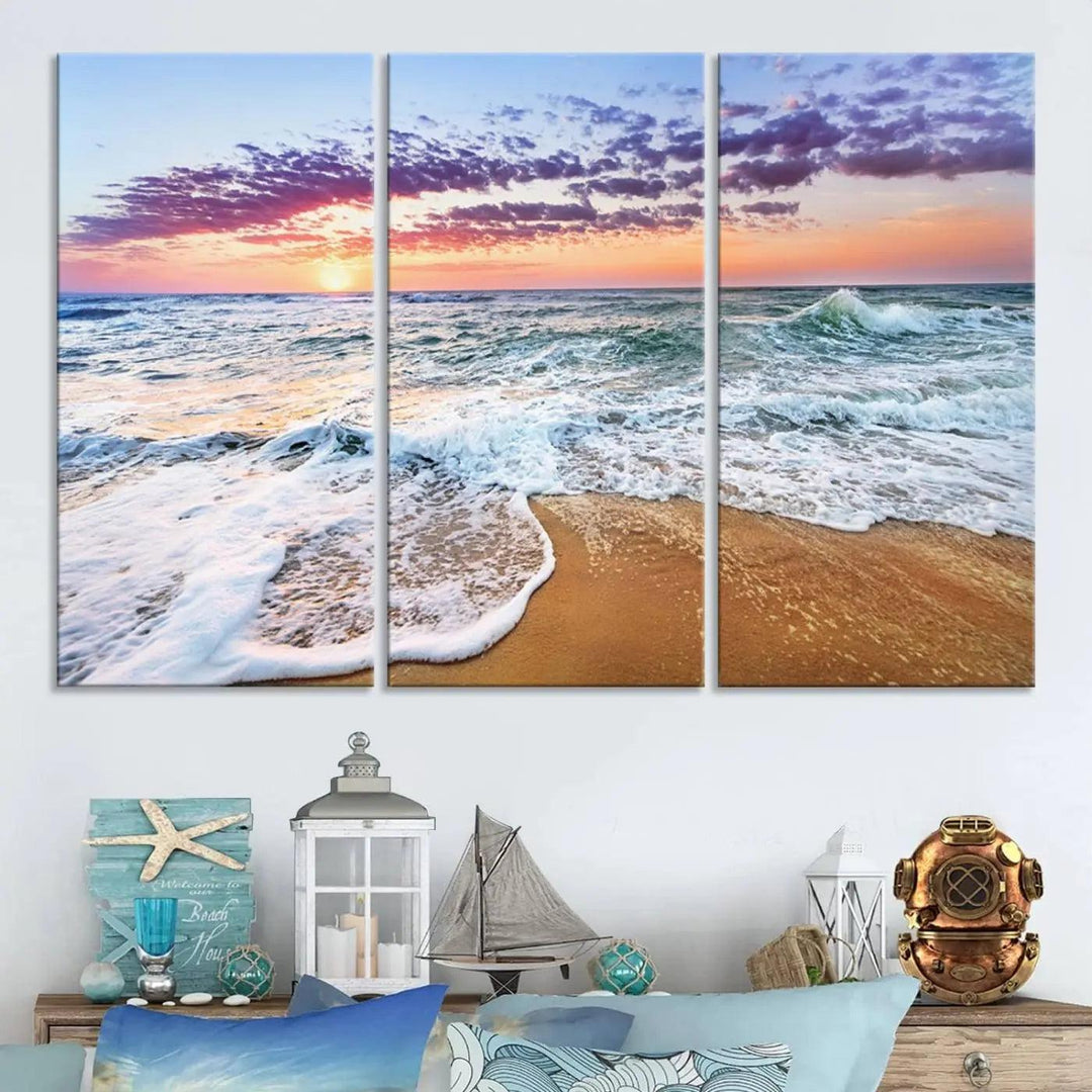 The "Vivid Sunset Ocean Waves Wall Art" hangs on the wall, capturing the serene beauty of the sea. This coastal beach canvas print triptych perfectly enhances living rooms and relaxation spaces.