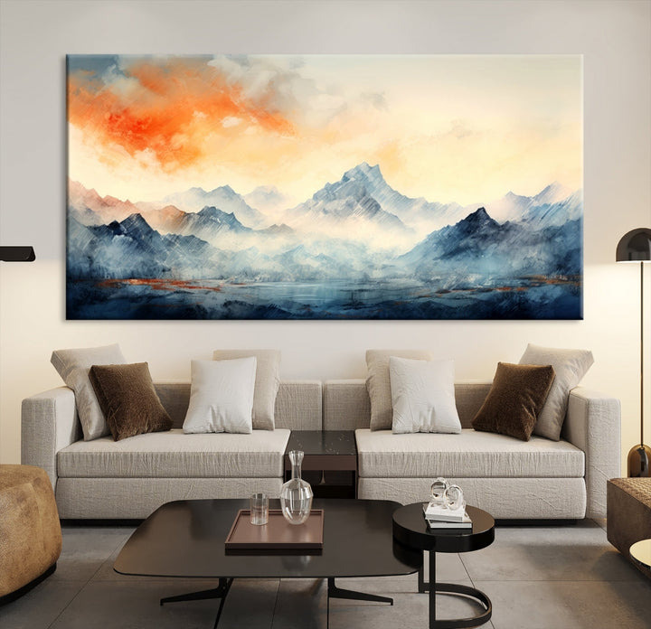 The Warm Clouds Abstract Mountain Wall Art Canvas Print enhances the living room with its museum-quality canvas and UV-protective coating, making it ready to hang on the wall.