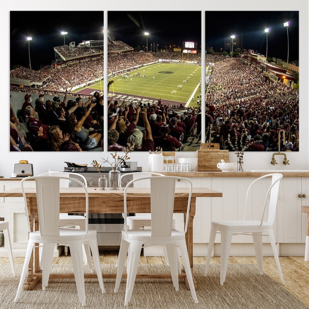 The Washington-Grizzly Stadium Canvas Print features a vibrant depiction of a packed football stadium at night. This American Football Wall Art is crafted on gallery-wrapped canvases with a UV-protective coating to maintain its lasting vibrancy.