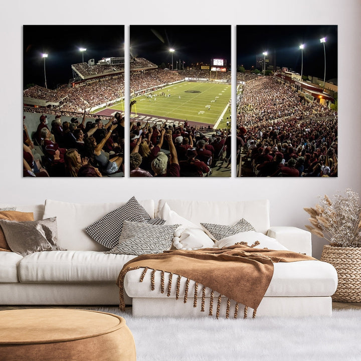 The Washington-Grizzly Stadium Canvas Print features a vibrant depiction of a packed football stadium at night. This American Football Wall Art is crafted on gallery-wrapped canvases with a UV-protective coating to maintain its lasting vibrancy.