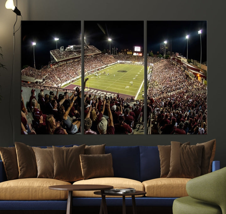 The Washington-Grizzly Stadium Canvas Print features a vibrant depiction of a packed football stadium at night. This American Football Wall Art is crafted on gallery-wrapped canvases with a UV-protective coating to maintain its lasting vibrancy.