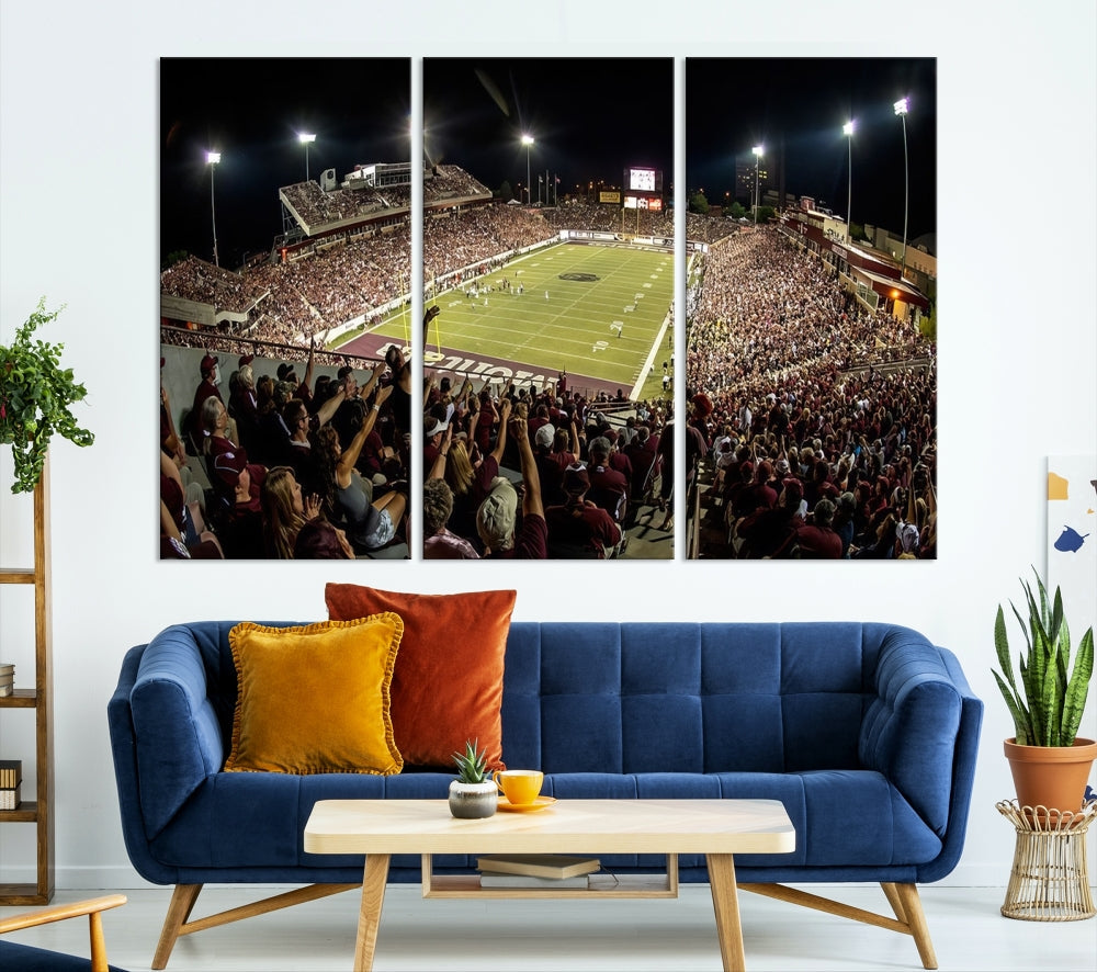 The Washington-Grizzly Stadium Canvas Print features a vibrant depiction of a packed football stadium at night. This American Football Wall Art is crafted on gallery-wrapped canvases with a UV-protective coating to maintain its lasting vibrancy.