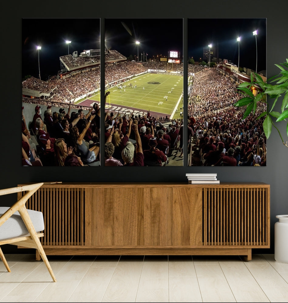 The Washington-Grizzly Stadium Canvas Print features a vibrant depiction of a packed football stadium at night. This American Football Wall Art is crafted on gallery-wrapped canvases with a UV-protective coating to maintain its lasting vibrancy.