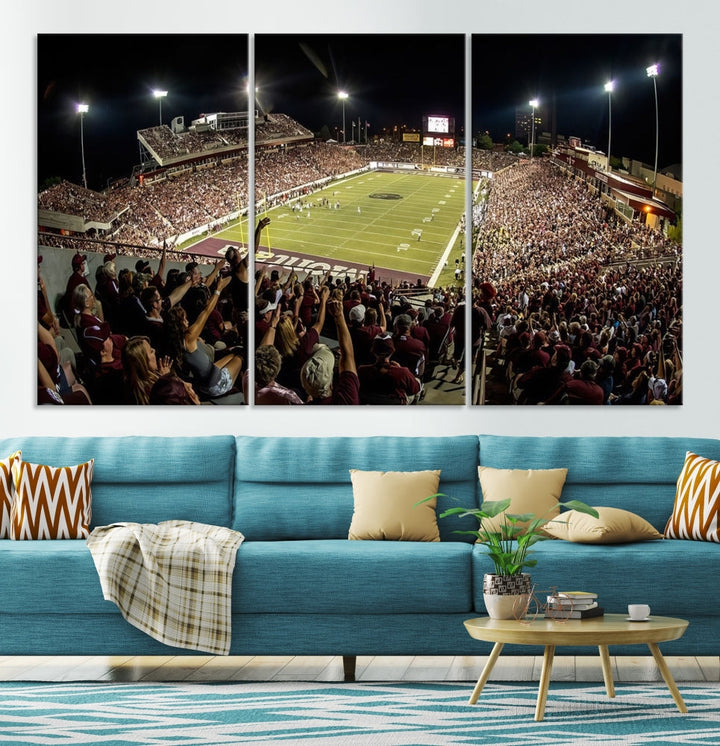 The Washington-Grizzly Stadium Canvas Print features a vibrant depiction of a packed football stadium at night. This American Football Wall Art is crafted on gallery-wrapped canvases with a UV-protective coating to maintain its lasting vibrancy.