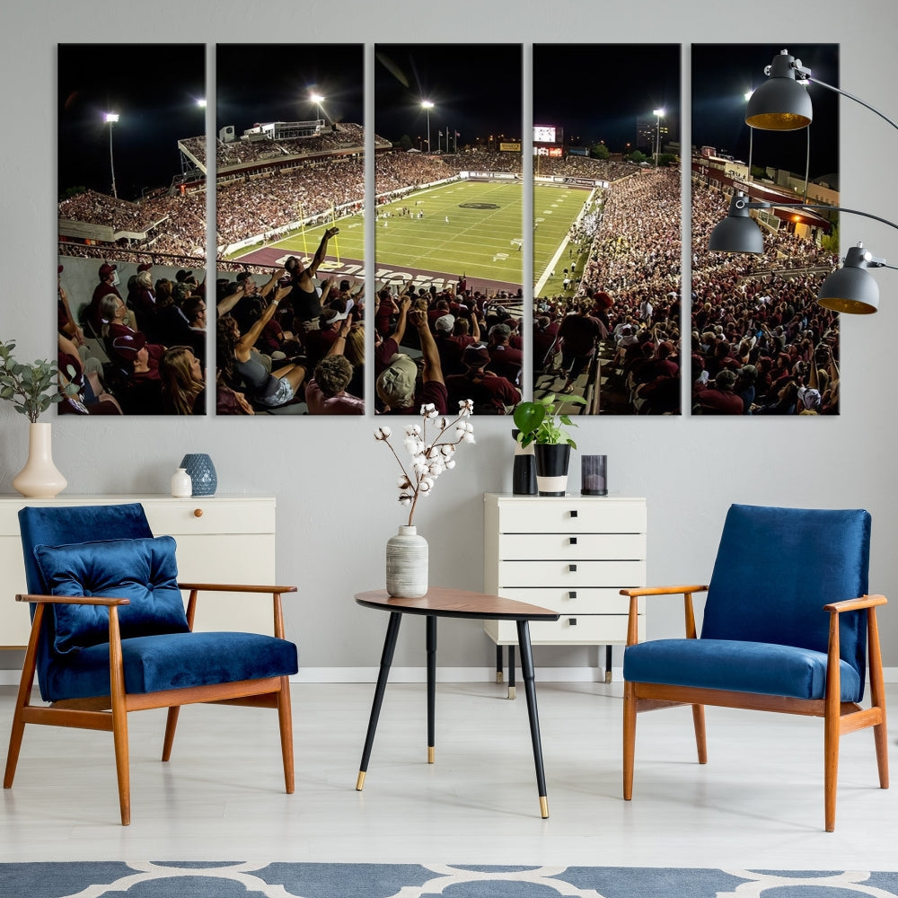 The Washington-Grizzly Stadium Canvas Print features a vibrant depiction of a packed football stadium at night. This American Football Wall Art is crafted on gallery-wrapped canvases with a UV-protective coating to maintain its lasting vibrancy.