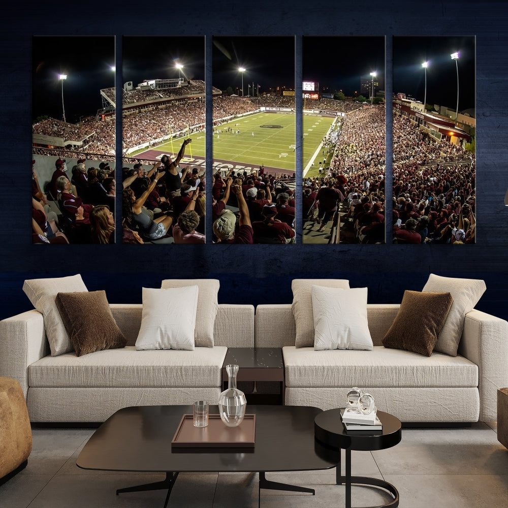 The Washington-Grizzly Stadium Canvas Print features a vibrant depiction of a packed football stadium at night. This American Football Wall Art is crafted on gallery-wrapped canvases with a UV-protective coating to maintain its lasting vibrancy.