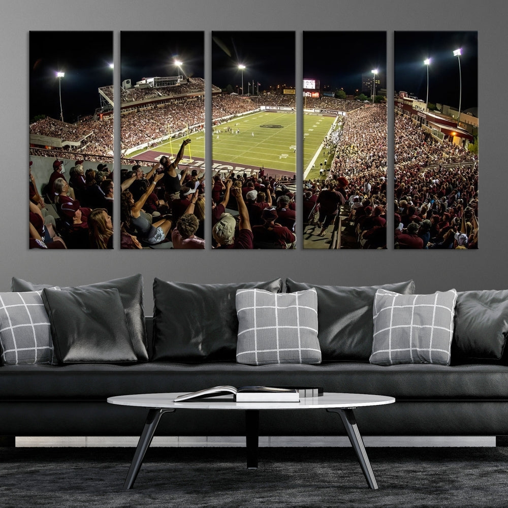 The Washington-Grizzly Stadium Canvas Print features a vibrant depiction of a packed football stadium at night. This American Football Wall Art is crafted on gallery-wrapped canvases with a UV-protective coating to maintain its lasting vibrancy.