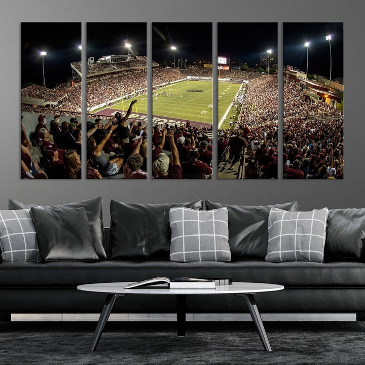 The Washington-Grizzly Stadium Canvas Print features a vibrant depiction of a packed football stadium at night. This American Football Wall Art is crafted on gallery-wrapped canvases with a UV-protective coating to maintain its lasting vibrancy.