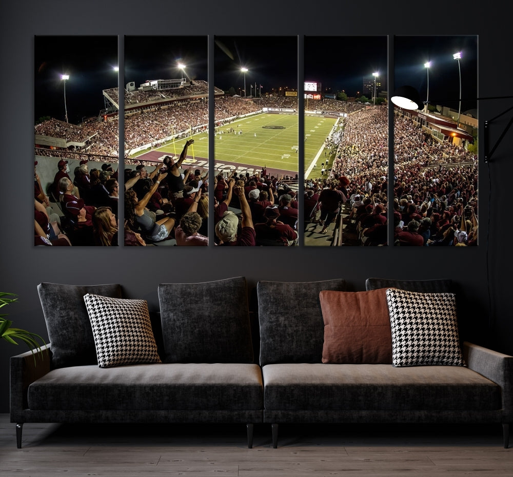 The Washington-Grizzly Stadium Canvas Print features a vibrant depiction of a packed football stadium at night. This American Football Wall Art is crafted on gallery-wrapped canvases with a UV-protective coating to maintain its lasting vibrancy.