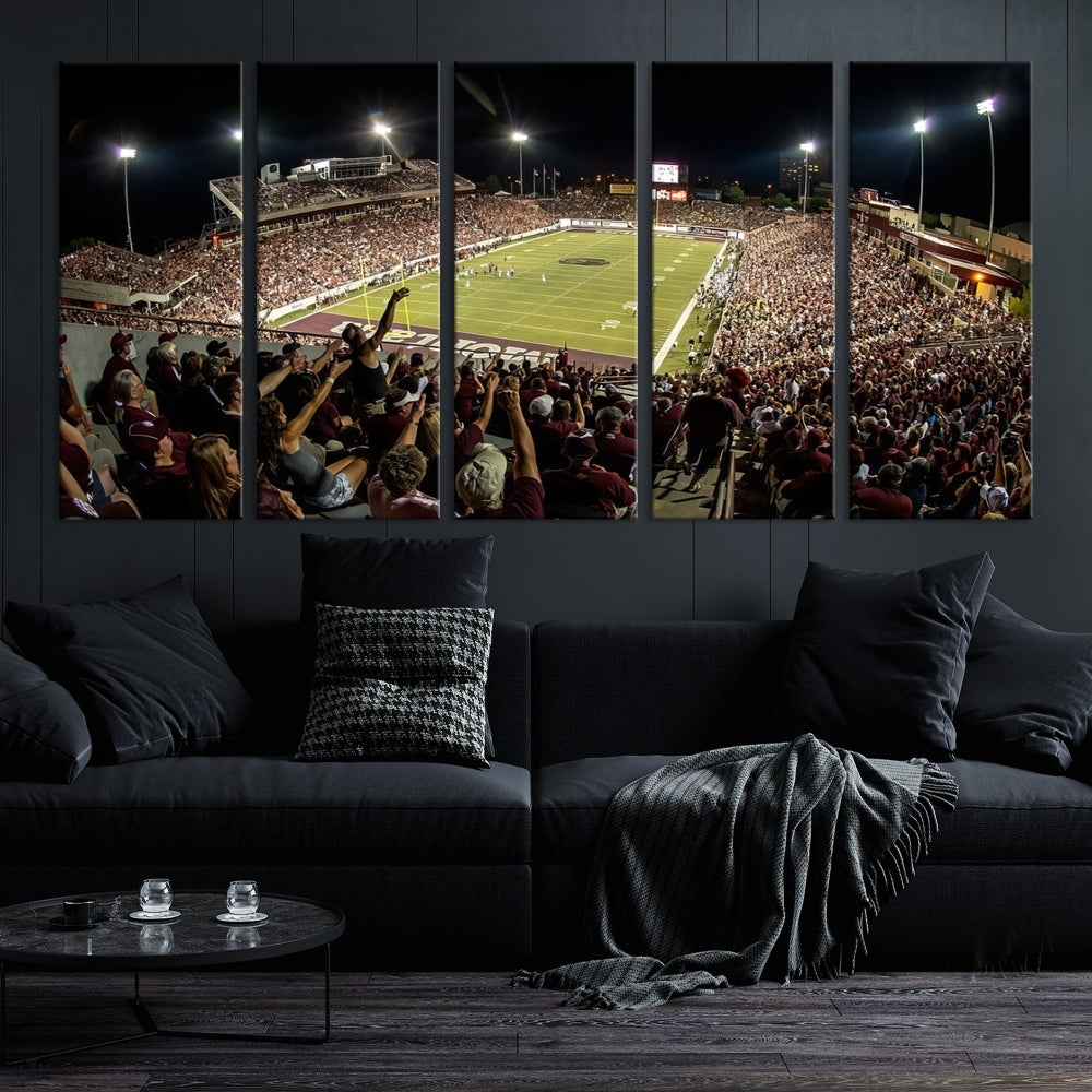 The Washington-Grizzly Stadium Canvas Print features a vibrant depiction of a packed football stadium at night. This American Football Wall Art is crafted on gallery-wrapped canvases with a UV-protective coating to maintain its lasting vibrancy.