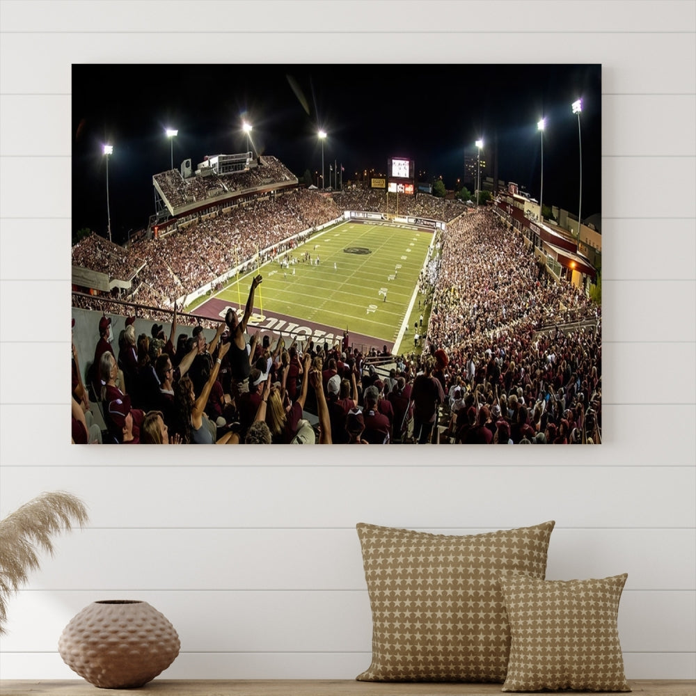 The Washington-Grizzly Stadium Canvas Print features a vibrant depiction of a packed football stadium at night. This American Football Wall Art is crafted on gallery-wrapped canvases with a UV-protective coating to maintain its lasting vibrancy.