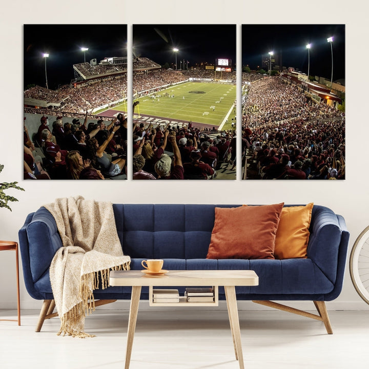 Panoramic triptych canvas of Washington-Grizzly Stadium during a thrilling night game, featuring a packed crowd and illuminated field. Perfect for sports fans, ready to hang.