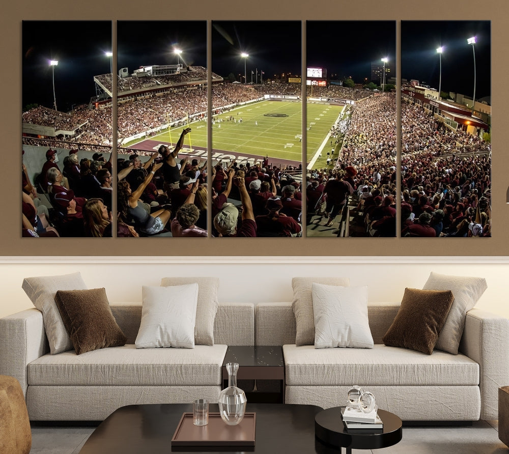 The Washington-Grizzly Stadium Canvas Wall Art – Exciting Game Night Atmosphere Captured in Panoramic Sports Photography offers a breathtaking view that adds a touch of vibrance to any modern living room. This ready-to-hang piece infuses your home with the dynamic energy of college football.