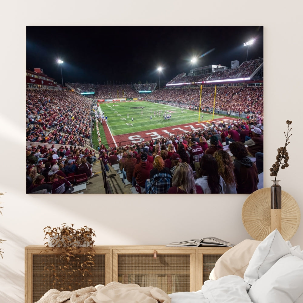 The Washington-Grizzly Stadium Canvas Wall Art beautifully depicts a lively night game scene under vibrant lights. The immersive game day atmosphere is captured in dynamic panoramic photography, making it ready to hang and enjoy.