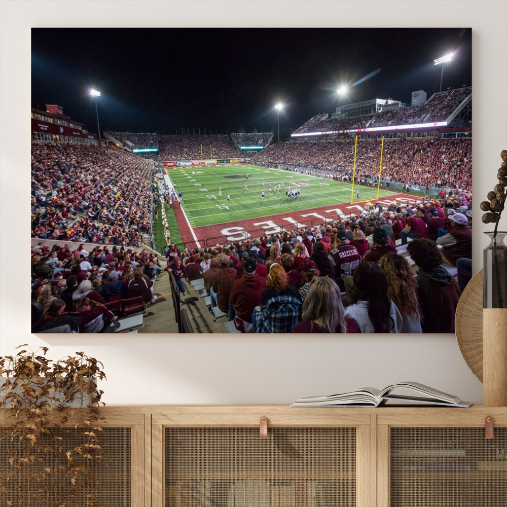 The Washington-Grizzly Stadium Canvas Wall Art beautifully depicts a lively night game scene under vibrant lights. The immersive game day atmosphere is captured in dynamic panoramic photography, making it ready to hang and enjoy.