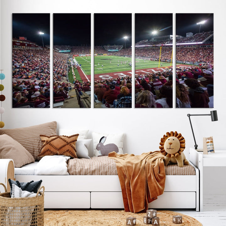 Panoramic triptych canvas of Washington-Grizzly Stadium during an intense game day scene, showcasing a packed crowd and vibrant field. Ideal for sports fans, ready to hang.