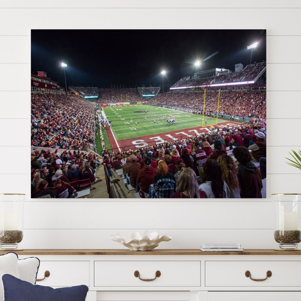 The Washington-Grizzly Stadium Canvas Wall Art beautifully depicts a lively night game scene under vibrant lights. The immersive game day atmosphere is captured in dynamic panoramic photography, making it ready to hang and enjoy.