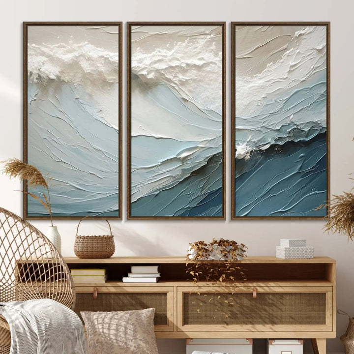 The Waves Abstract Wall Art Print is a large textured painting featuring ocean waves in beige and blue tones. This modern framed abstract canvas print captures the serene essence of seaside tranquility and serves as stunning ready-to-hang wall art, making it perfect as living room decor.