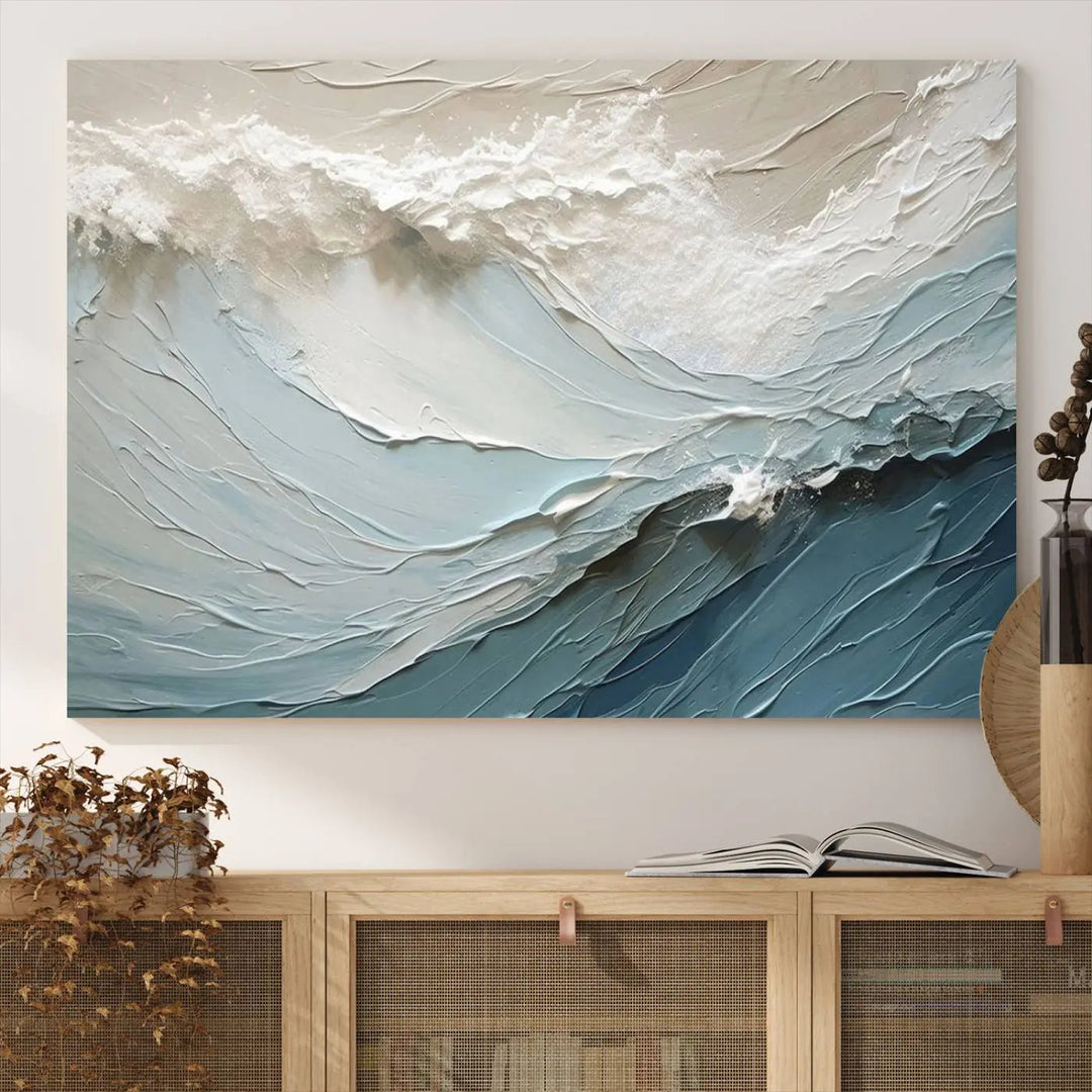 The Waves Abstract Wall Art Print, a captivating piece of modern framed abstract canvas, beautifully decorates the wall. This abstract painting is designed to enhance your living room decor and offers the convenience of being ready to hang.