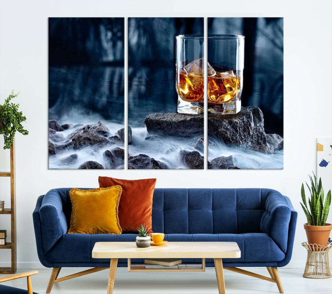 The Whiskey Ice Wall Art Canvas Print, a triptych featuring a glass of whiskey on the rocks, is crafted with a gallery-quality finish on premium canvas.