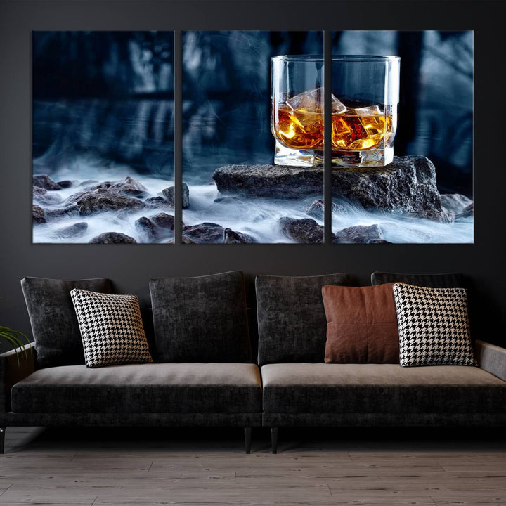 The Whiskey Ice Wall Art Canvas Print, a triptych featuring a glass of whiskey on the rocks, is crafted with a gallery-quality finish on premium canvas.