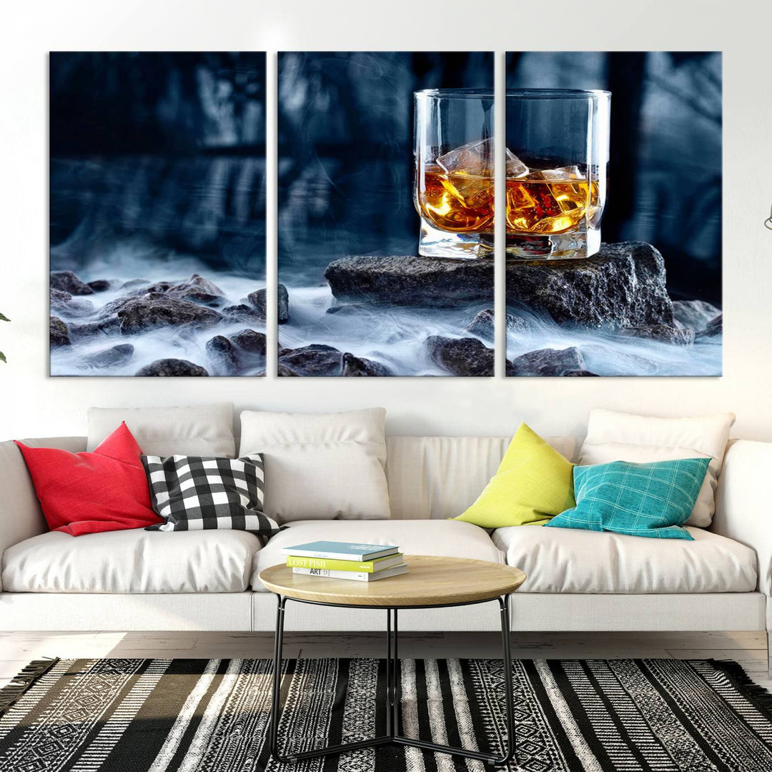 The Whiskey Ice Wall Art Canvas Print, a triptych featuring a glass of whiskey on the rocks, is crafted with a gallery-quality finish on premium canvas.