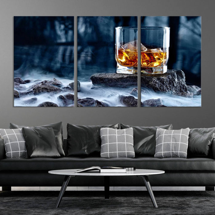 The Whiskey Ice Wall Art Canvas Print, a triptych featuring a glass of whiskey on the rocks, is crafted with a gallery-quality finish on premium canvas.