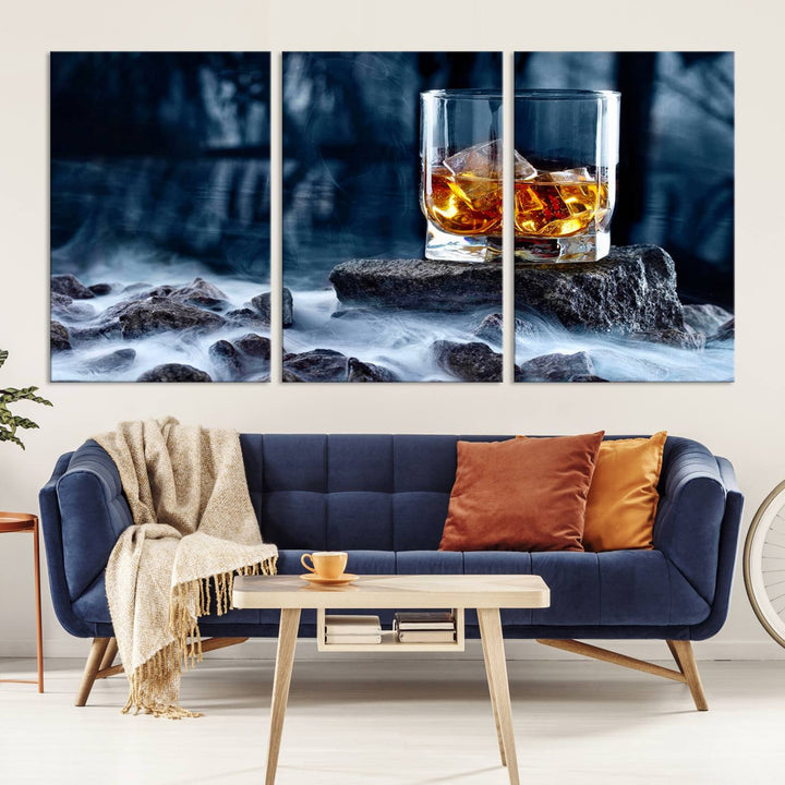 The Whiskey Ice Wall Art Canvas Print, a triptych featuring a glass of whiskey on the rocks, is crafted with a gallery-quality finish on premium canvas.