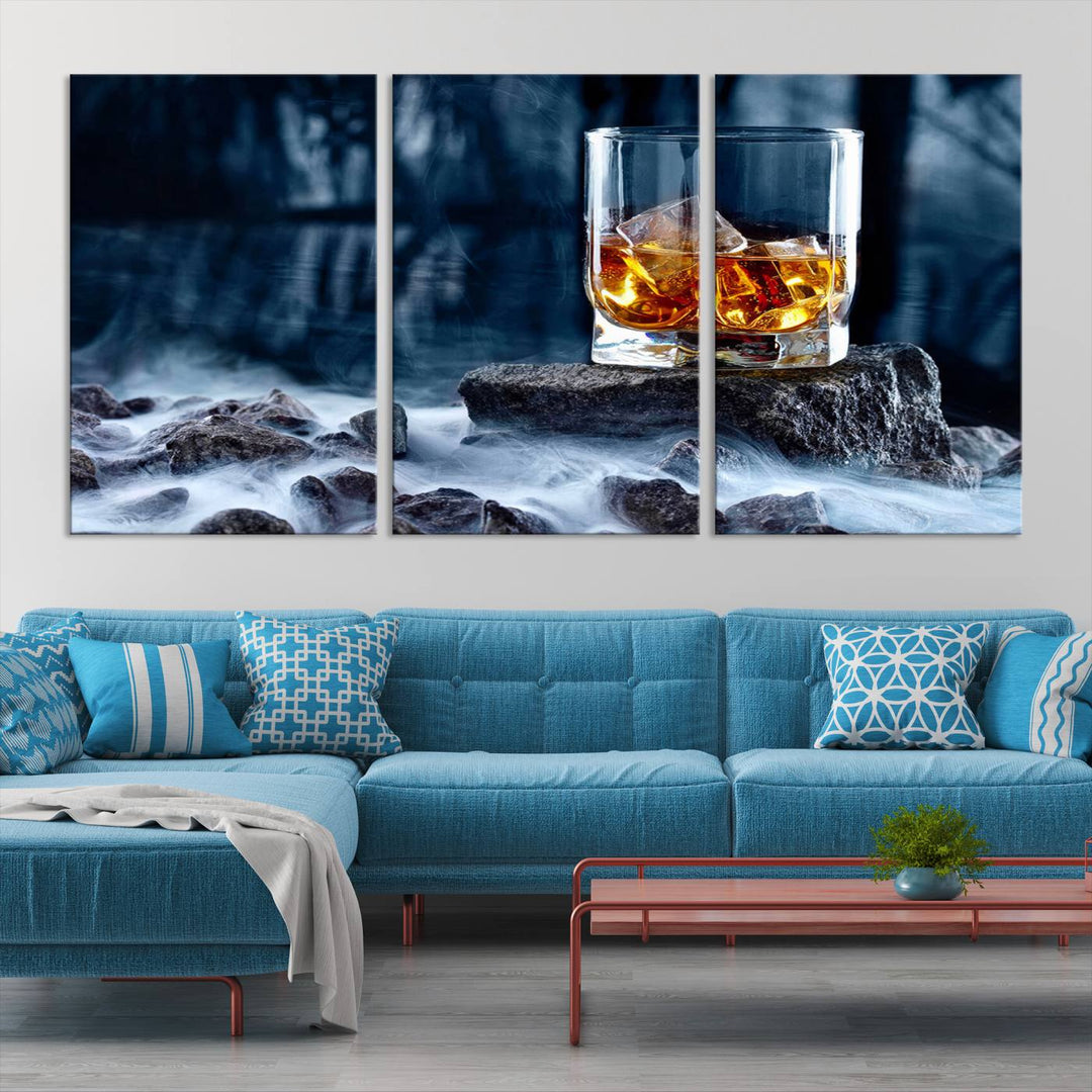 The Whiskey Ice Wall Art Canvas Print, a triptych featuring a glass of whiskey on the rocks, is crafted with a gallery-quality finish on premium canvas.