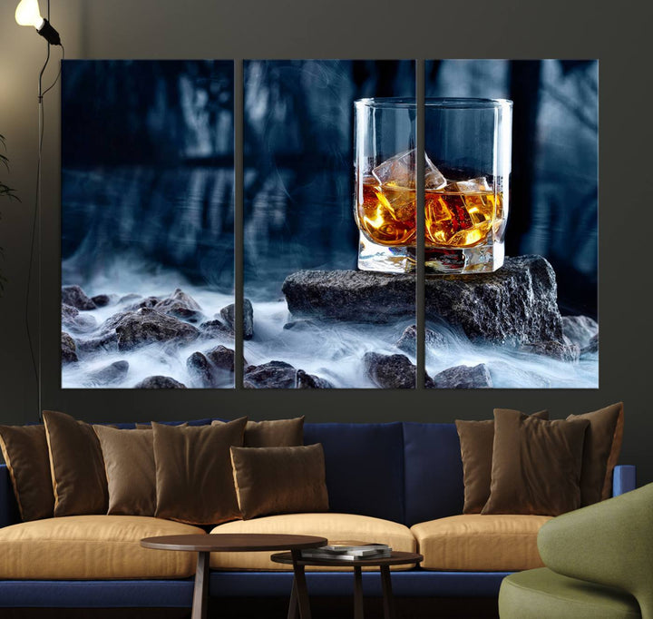 The Whiskey Ice Wall Art Canvas Print, a triptych featuring a glass of whiskey on the rocks, is crafted with a gallery-quality finish on premium canvas.