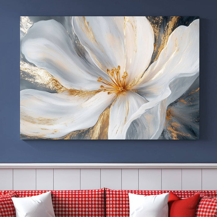 A triptych of "White and Gold Floral Canvas Wall Art - Framed and Ready to Hang" adorns the wall, creating an elegant modern living room display.